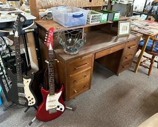 Vintage desk and two guitars