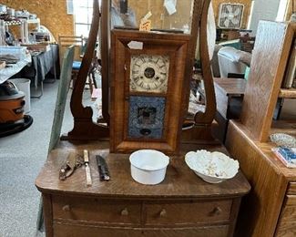 Antique dresser and weight driven clock.  Late 1800's