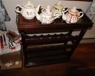 Teapot collection and wine rack Wine Rack is $30