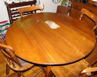 Round to oval kitchen table with 4 chairs needs refinishing $200