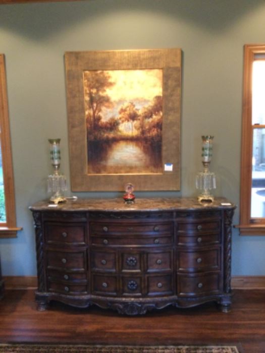 Very ornate marble top sideboard; pair of antique lusters with prisms; fabulous framed art