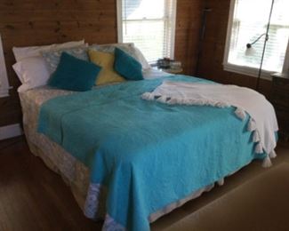 King size bed with pillowtop mattress, frame, and pretty bedding