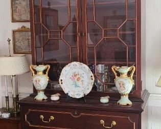 This secretary is amazing. The fret work in the scroll is incredible.