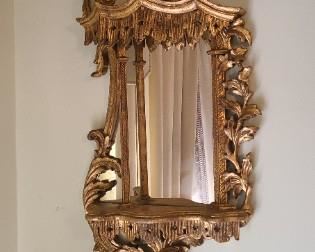 LOVE this asymmetrical sconce/mirror!