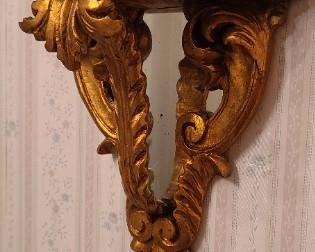 Mirrored wall sconce
