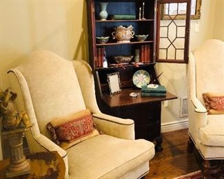 Small secretary between pair of wing chairs