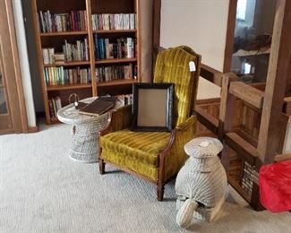 Oval wicker table, Mid Century Modern velvet arm chair,  wicker turtle side table, book cases