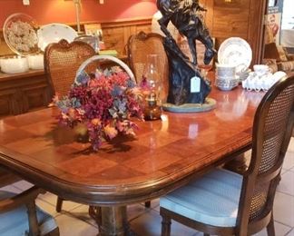 Dining table, 2 leaves, double pedestal, cane chairs