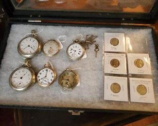 Pocket watches and coins