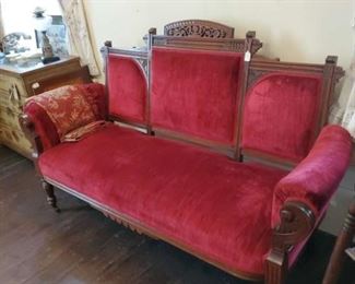 Red Victorian walnut settee