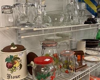 Vintage cookie jar, MCM ceramic w wood lids set of 4 canisters, crystal cardle sticks, MCM set of 2 mushroom/tomato storage jars, MCM condiment holder, syrup dispenser, clear bowls and platters