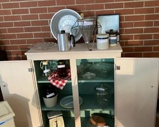farmhouse cabinet and vintage glassware