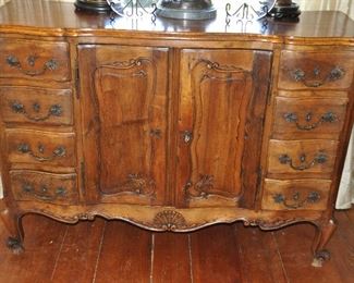 Antique French Chestnut Buffet, c.1860, with Eight Drawers and Doors that open to Two Interior Shelves. W55" x H40" x D18"