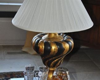 Black and Gold Painted 32" Swirl Table Lamp with a Silk Lamp Shade Shown with Waterford Crystal Champagne Glasses and a 8" Vintage Julia Crystal Vase Made in Poland