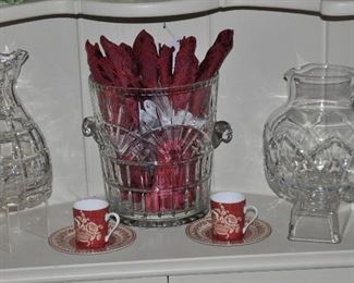 Heavy Cut Crystal Pitchers Shown with a Heavy Cut Glass Ice Bucket with Handles. There is also a pair of Patrick Frey, Limoges "Paniers Fleuris" Demitasse Cups with Saucers Available