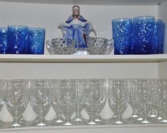 More Vintage Blue Seneca Driftwood, including Six 8 oz. and Six 12oz. Glasses. Shown with a Vintage "Little Old Lady" Teapot by Tony Wood, Staffordshire, England. On the Bottom Shelf, are Three Sets of 6 Footed Glasses.