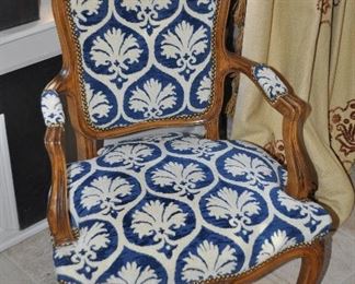 One of Two Louis XV Style Fauteuil Arm Chairs with Carved Walnut and Cut Velvet Upholstery. W25" x H36" x D21"