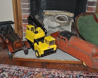 Wood and Metal Replica of an Antique Car, shown with a Vintage Tonka Crane Truck and an Large Antique Marx Ride On Pressed Steel Train Engine