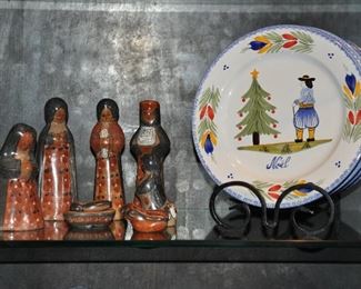 Set of 4 Quimper Pottery France Noel Dessert Plates Shown with a Vintage Mexican Art 8 piece Wooden Creche Nativity Scene