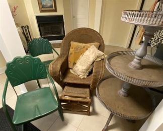 Vintage metal arm chairs, antique wicker chair with pull out leg rest & 3 tiered display fixture.