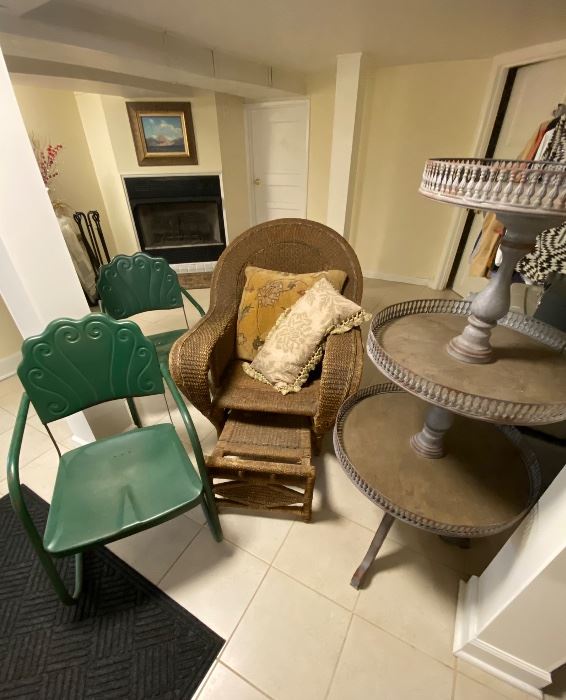 Vintage metal arm chairs, antique wicker chair with pull out leg rest & 3 tiered display fixture.