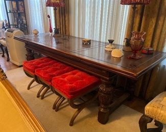 Oak Large Library Jacobean Style Carved Refractory Table. Rectangular paneled top with two pull-out leaves conforming apron raised on lobed and acanthus carved urn leags ending in block feet joined by modified H-stretcher. American 30" high, width 96", depth 36". Stools to be sold Separately.