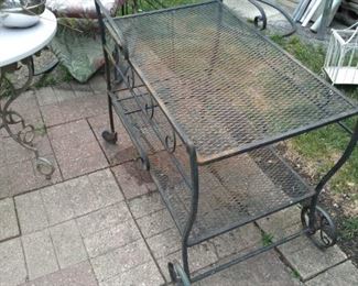 Vintage black metal patio/yard serving cart with wheels and handle. **was $55.00 now $45.00**