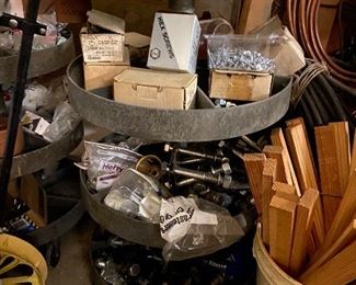 There are 2 heavy duty revolving storage bin shelving