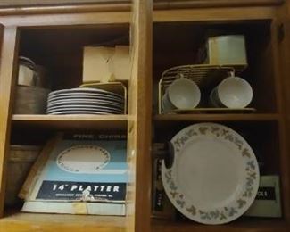 Dishware, platters, Pyrex, serving dishes, an antique lazy Susan 