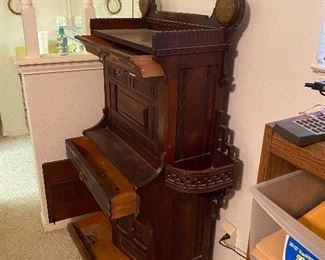 Very rare antique secretary type desk with two very ornate side shelves and numerous drawers
