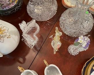 lace small glass blown statues.  Crystal decanters