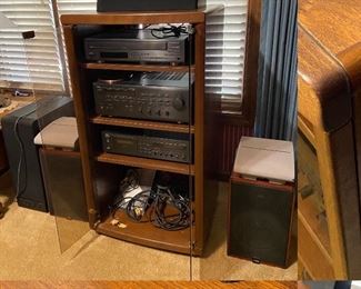 Walnut stereo cabinets with glass doors