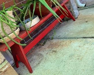 Red bench enough to seat three adults… Nice and sturdy