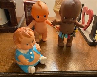 Vintage white and black Kewpie dolls living in harmony....