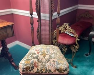 INTRICATELY CARVED SIDE CHAIR  WITH WICKER