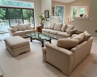 Cream Color living room set 
The right arm of the couch has a light stain  otherwise In beautiful condition. 