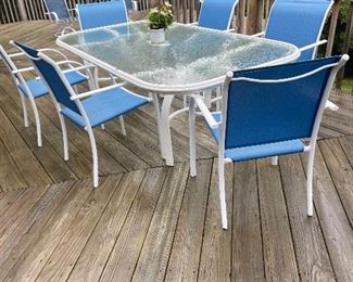 White and blue Patio set/glass top table 