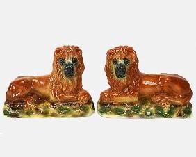 Pair of Late 19th Century English Staffordshire Porcelain Lying Lion Figures