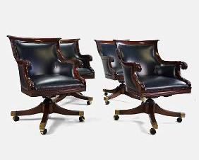 Four Empire Style Smith and Watson Leather and Wood Armchairs on Casters