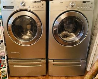 $450 
LG Tromm washer & dryer on risers&nbsp;