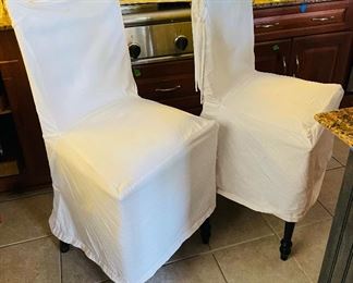 $100 
Pair of slip covered barstools&nbsp;