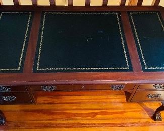 $395 
National Mount Airy desk with leather top 56Lx28Tx30H