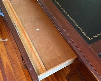 $395 
National Mount Airy desk with leather top 56Lx28Tx30H