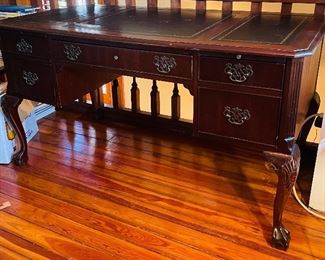 $395 
National Mount Airy desk with leather top 56Lx28Tx30H