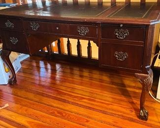 $395 
National Mount Airy desk with leather top 56Lx28Tx30H