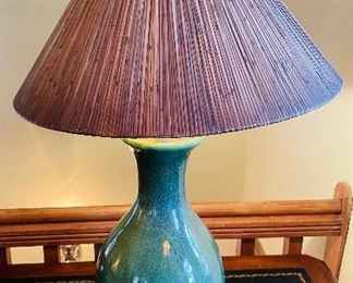 $95 
Green pottery lamp on desk&nbsp;