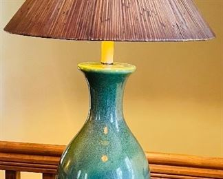 $95 
Green pottery lamp on desk&nbsp;