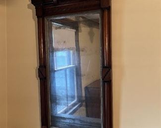 Eastlake incised walnut pier glass 