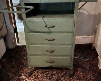 Green painted steel medical cabinet on casters 