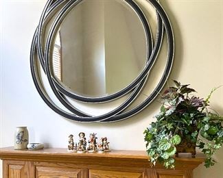 Large, heavy circles mirror. Hummles.